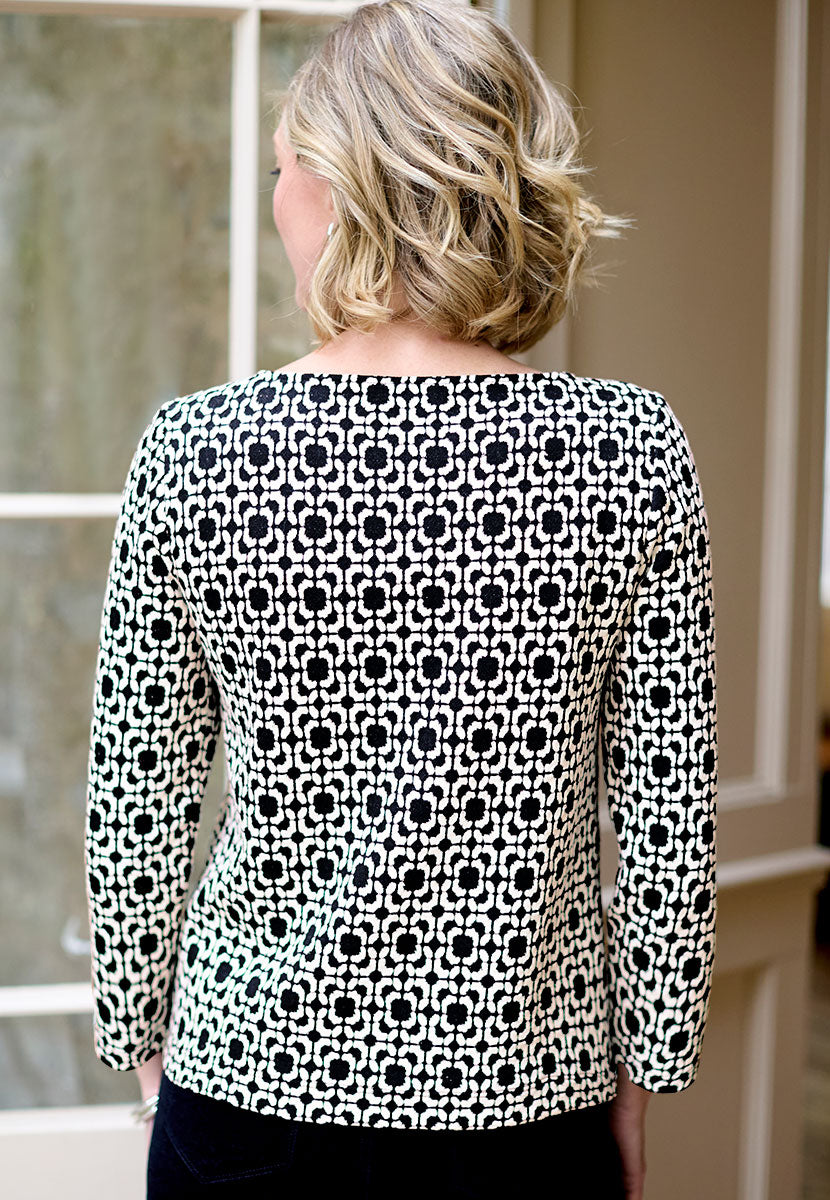 Adelina Jacquard Top - Black Black and White Print Slash Neck with Bracelet Length Sleeves and Side Slits Back View