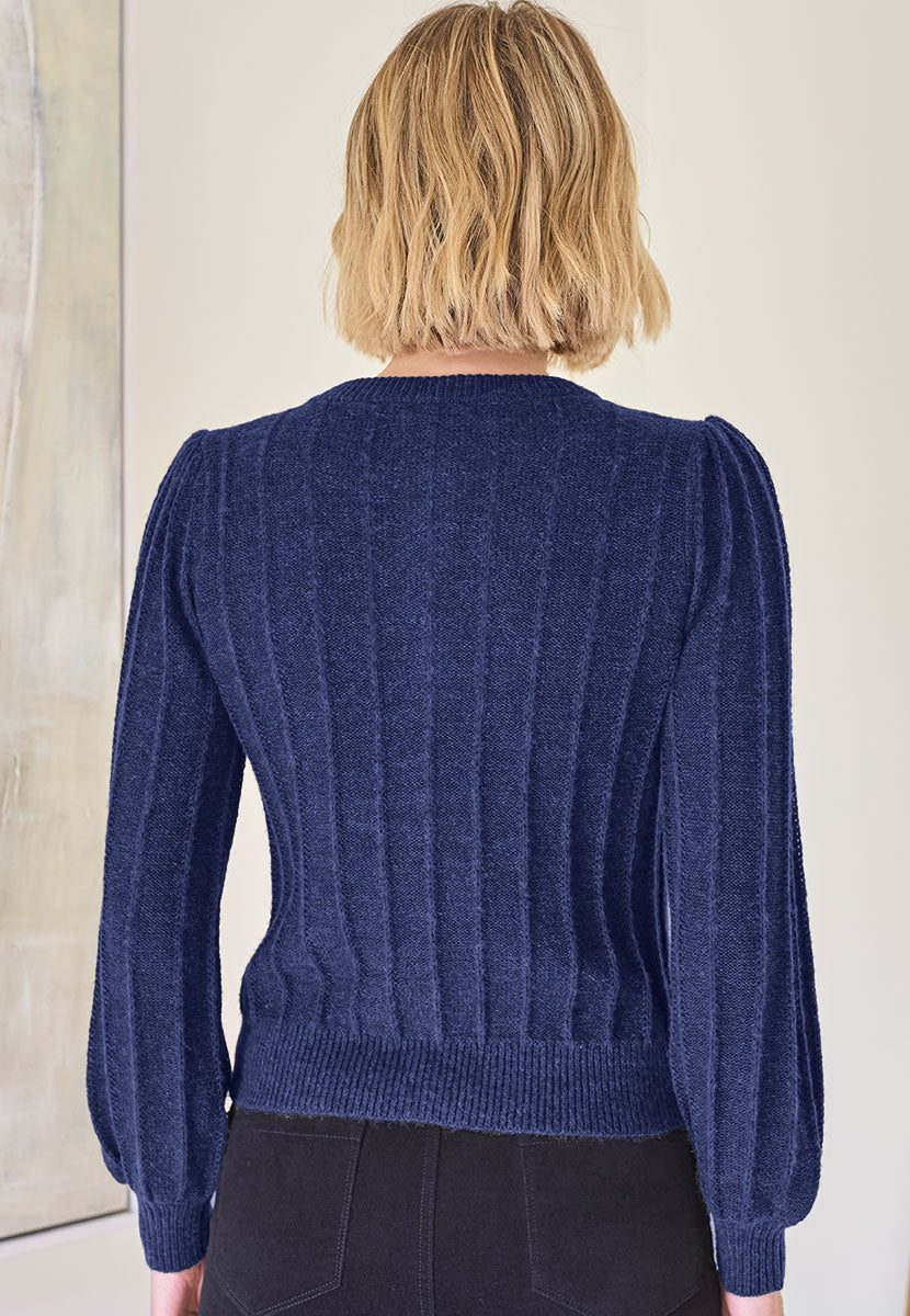 Avril Rib Knitted Cardigan - Navy Dark Blue Luxurious Knit Lacy Rib Detail Soft Fluffy Stylish Modern Short Shape with Full Sleeves Gathered Shoulders Back View