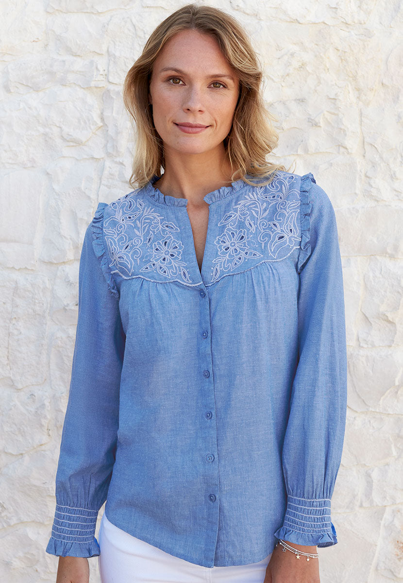 Betsy Long Sleeve Open Notch Frill Neck Cotton Blouse - Chambray Blue Deep Smocked Cuffs Button Front with embroidery detailing Front Alt