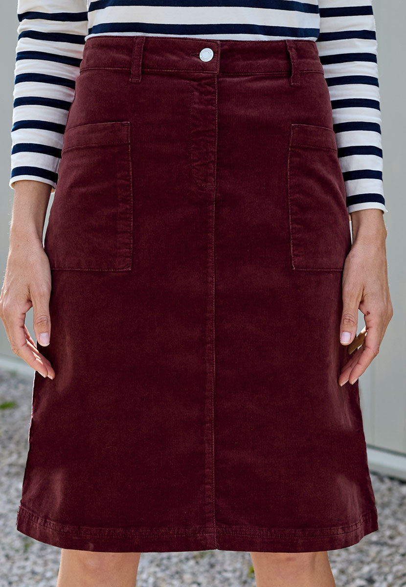 Coco Corduroy Skirt - Deep Berry Timeless A-Line Shape Patch Pocket Detail Needlecord Fabric with Velvety Finish Zip Fly and Belt Loops Front Alt View