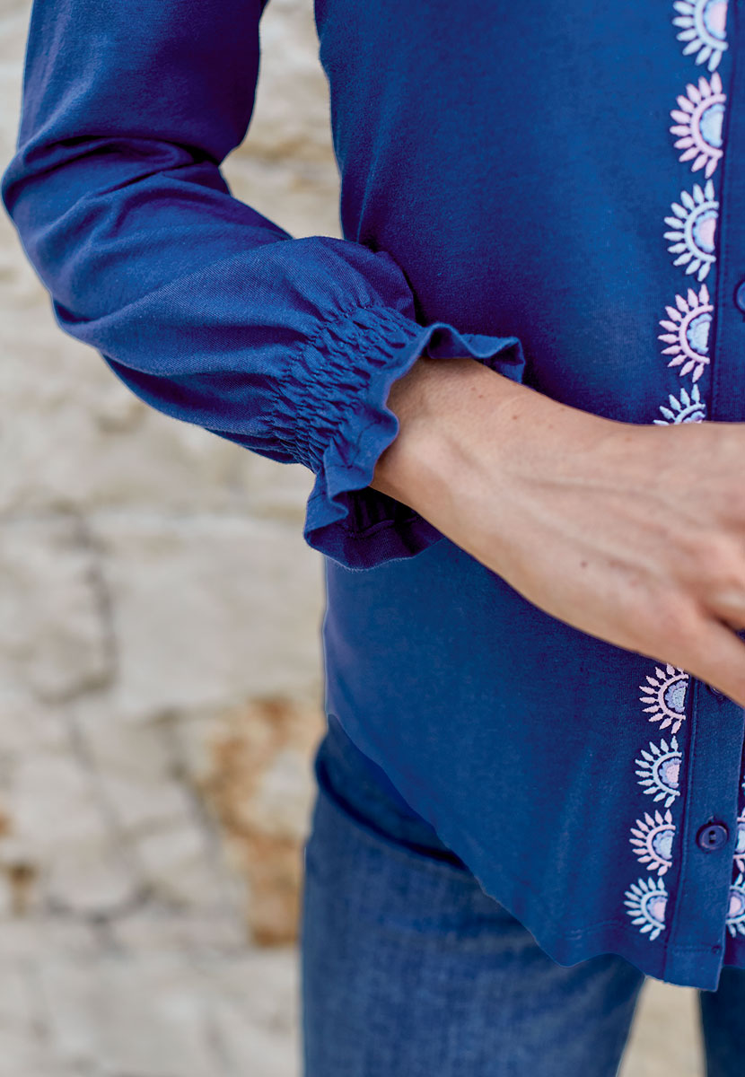 Kianna Embroidered Long Sleeve Blouse - French Navy Button Through Frill Cuff Open V Neck Detail View