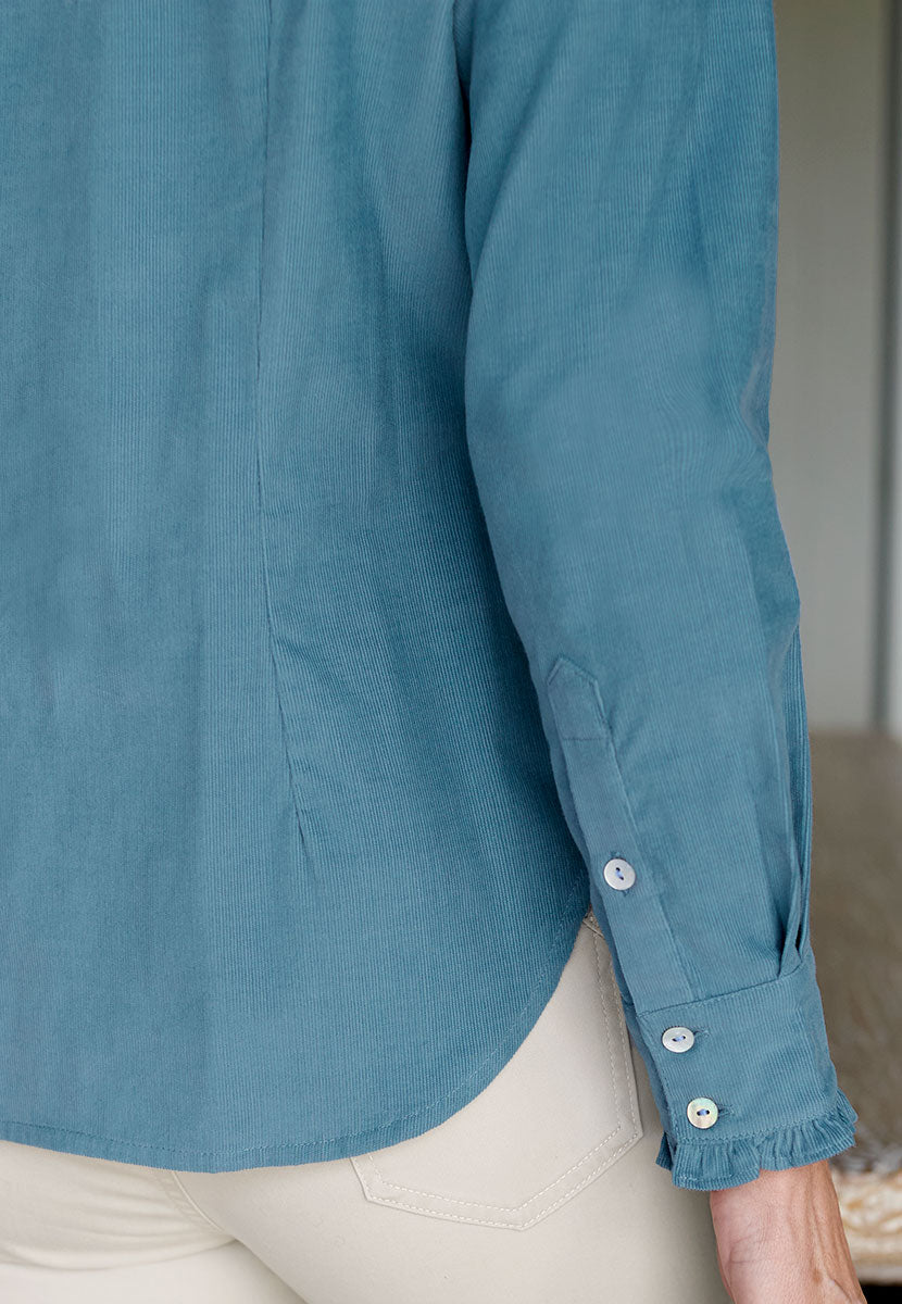 Lydia Button Through Cord Shirt - Chambray Blue Soft Cord Texture Gentle Ruffle Trims Long Sleeves and Button Cuffs Back View