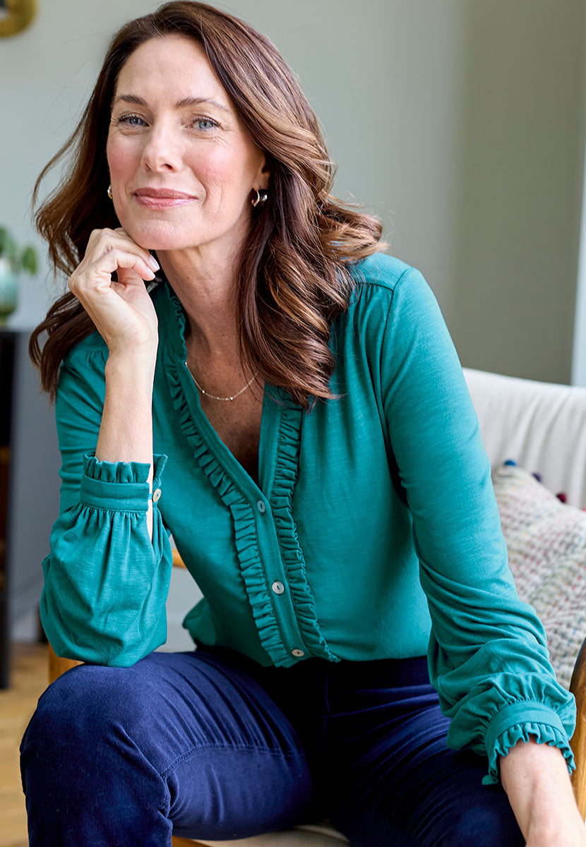 Martine Long Sleeve Collared Jersey Blouse - Teal Green Blue with Open V-Neck Button Through Detail Elasticated Buttoned Cuffs and Ruffle Trims Front Alt View
