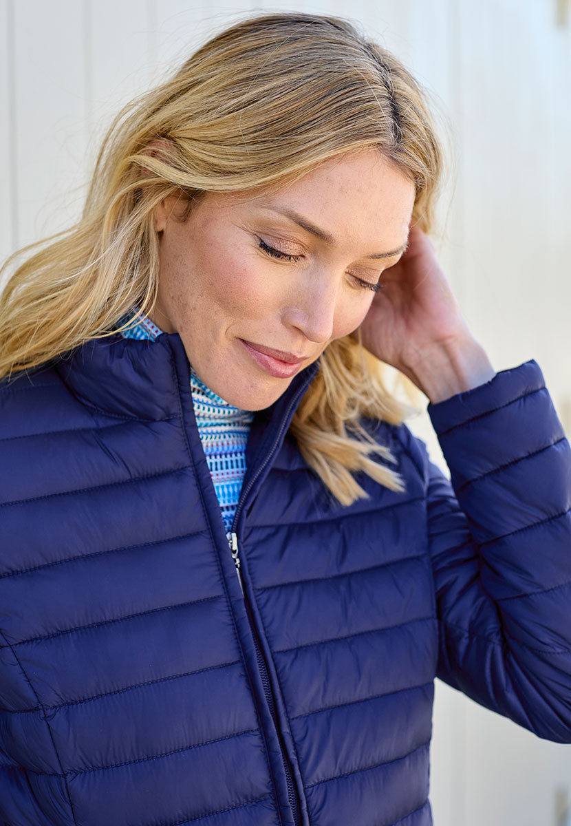 Millie Full-Length Sleeve Padded Jacket - Navy Stylish Layer For Cooler Days Neat Stand Up Collar Zip Front with Shaped Seams Creating A Flattering Silhouette Detail View