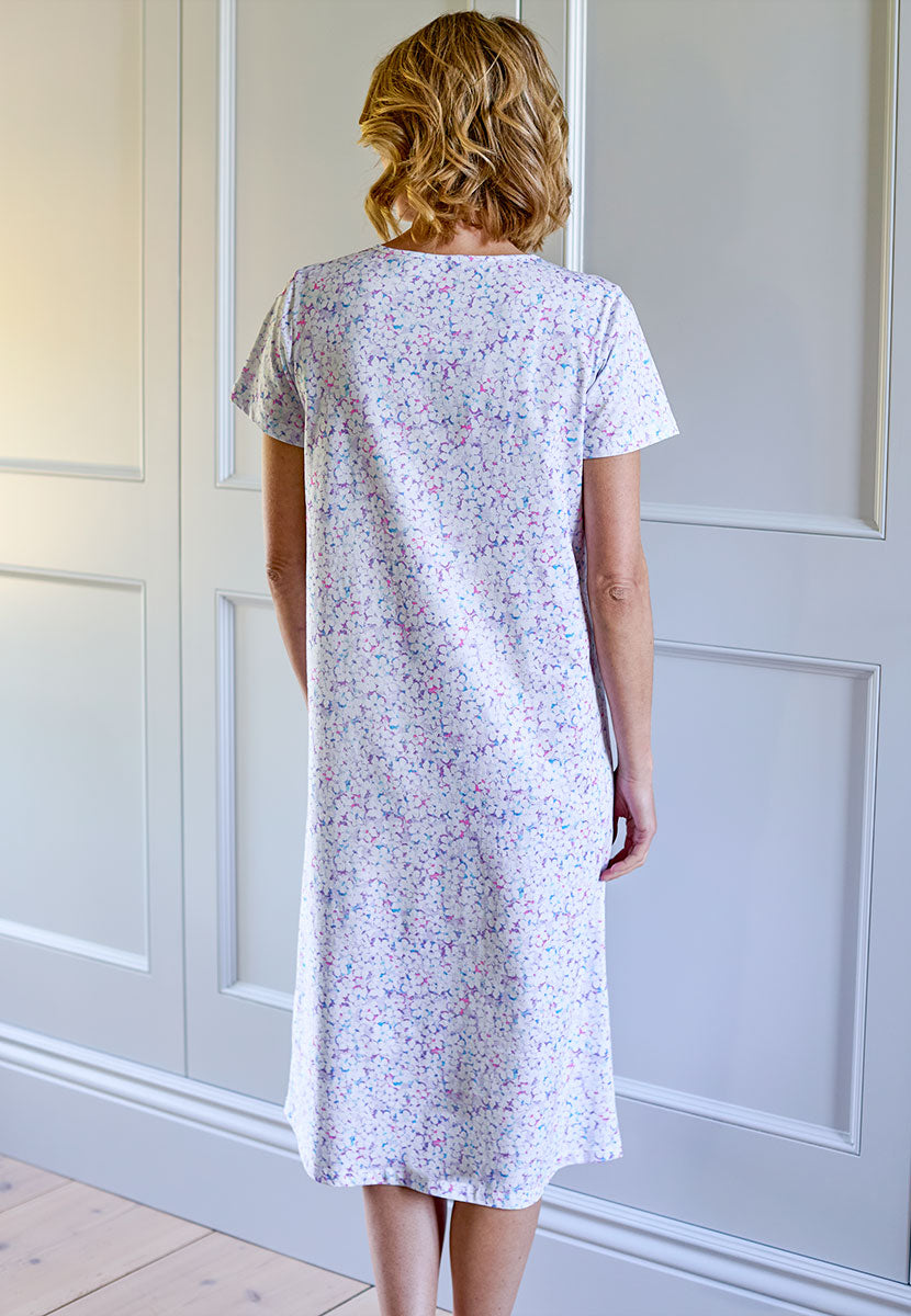 Rosalyn Cotton Jersey Nightdress - Flora Print Purple and White Floral Print V-Neck Short Sleeve Nightdress with Pleat Details Back View