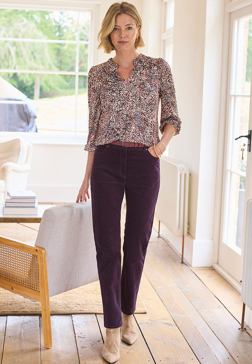 Vanessa Velvet Jean Blackcurrant Front View with the Suri Blouse and Bordeaux Belt
