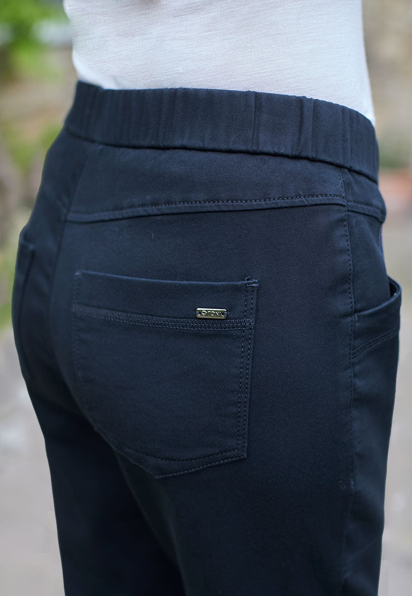 Toni Suki Tapered Trouser - Dark Navy Soft Peach-Finish Fabric and Stretch For Extra Comfort Pull on Style With Deep Pockets Back Detail View
