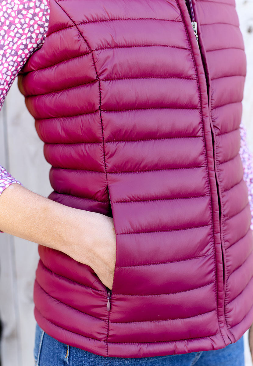 Zoe Padded Gilet - Berry Lightly Padded For Warmth with a Casual Style Stand Collar Full Zip and Side Pockets Detail View