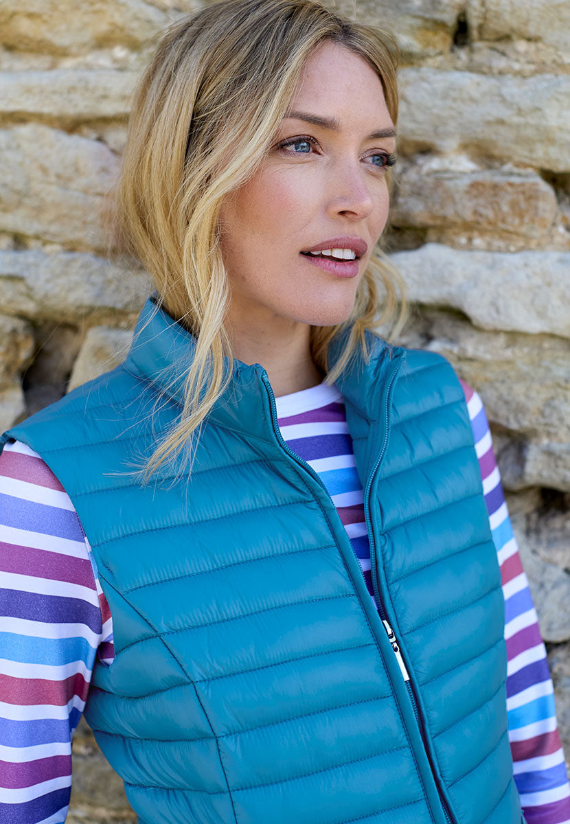 Zoe Padded Gilet - Teal Lightly Padded For Warmth with a Casual Style Stand Collar Full Zip and Side Pockets Detail View